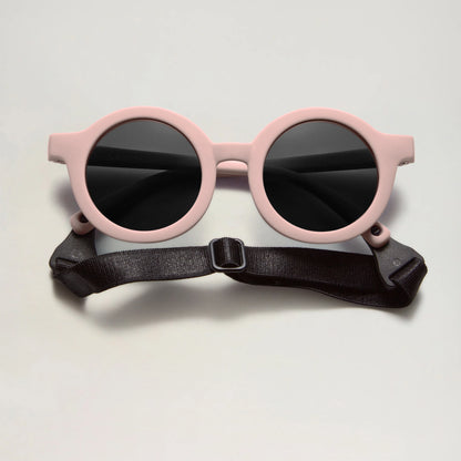 lunettes de soleil bébé pliable ronde rose babymocs