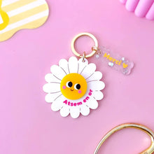 porte clés fleur atsem en or